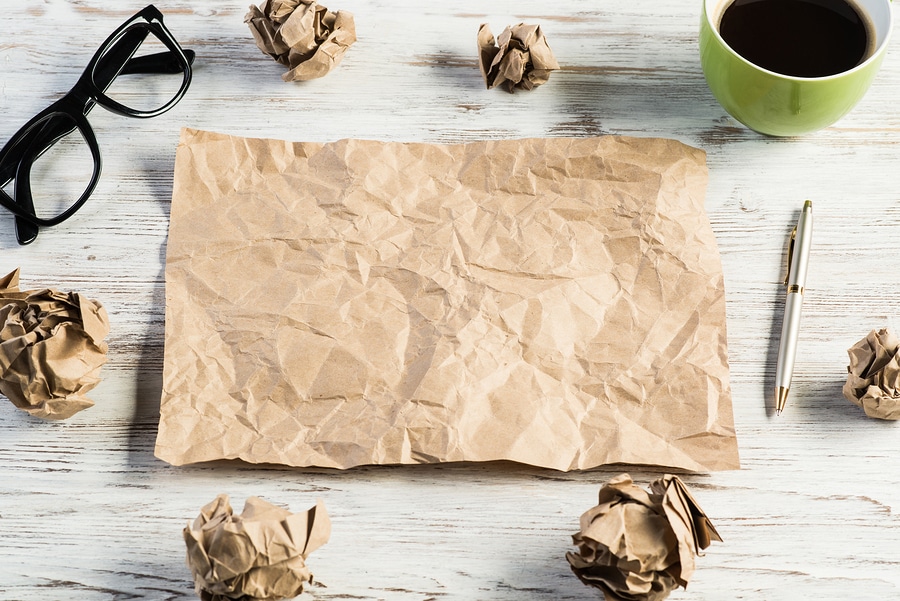 Crumpled paper at work desk