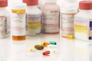 image of prescription medicine bottles, close up of variety of pills