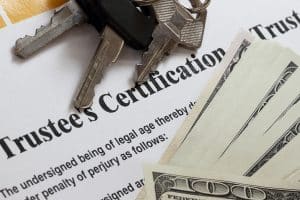 Trustee Certificate with money and key