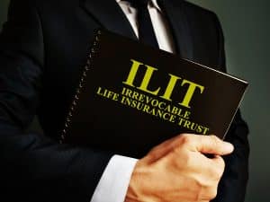 Man Holds Irrevocable Life Insurance Trust Policy.