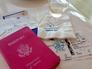 passport and boarding pass demonstrating international travel for expats