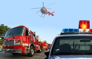 Emergency vehicles and helicopter on accident scene