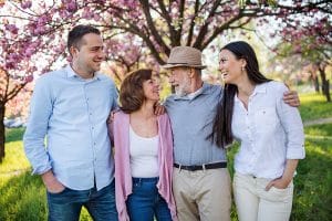 family hugging and smiling happily