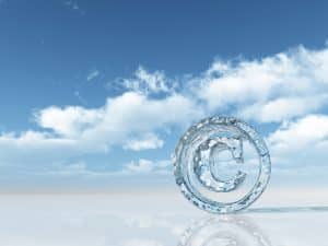 frozen copyright symbol under cloudy blue sky - 