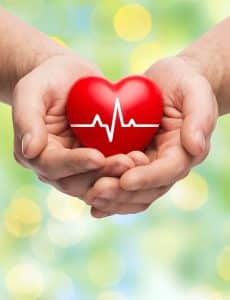 image of a heart shape with a lifeline across it inside someones open hands