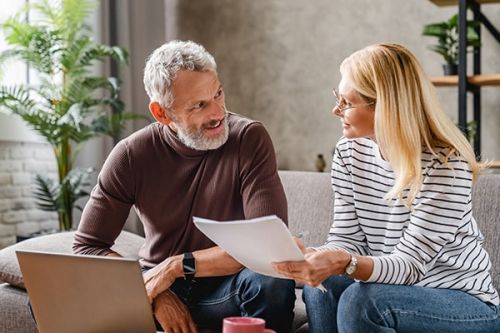 Aging Strategies. Smiling middle aged couple