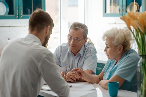 elderly couple visits with an Estate Planning Attorney