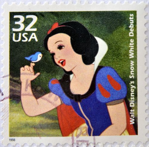 US Postage stamp Snow White singing to a blue bird