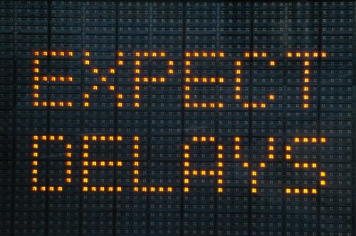 Urban traffic congestion sign saying Expect Delays demonstrating probate delays