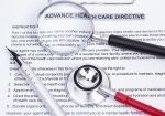 Image shows an advanced directive, stethoscope, magnifier and a pencil